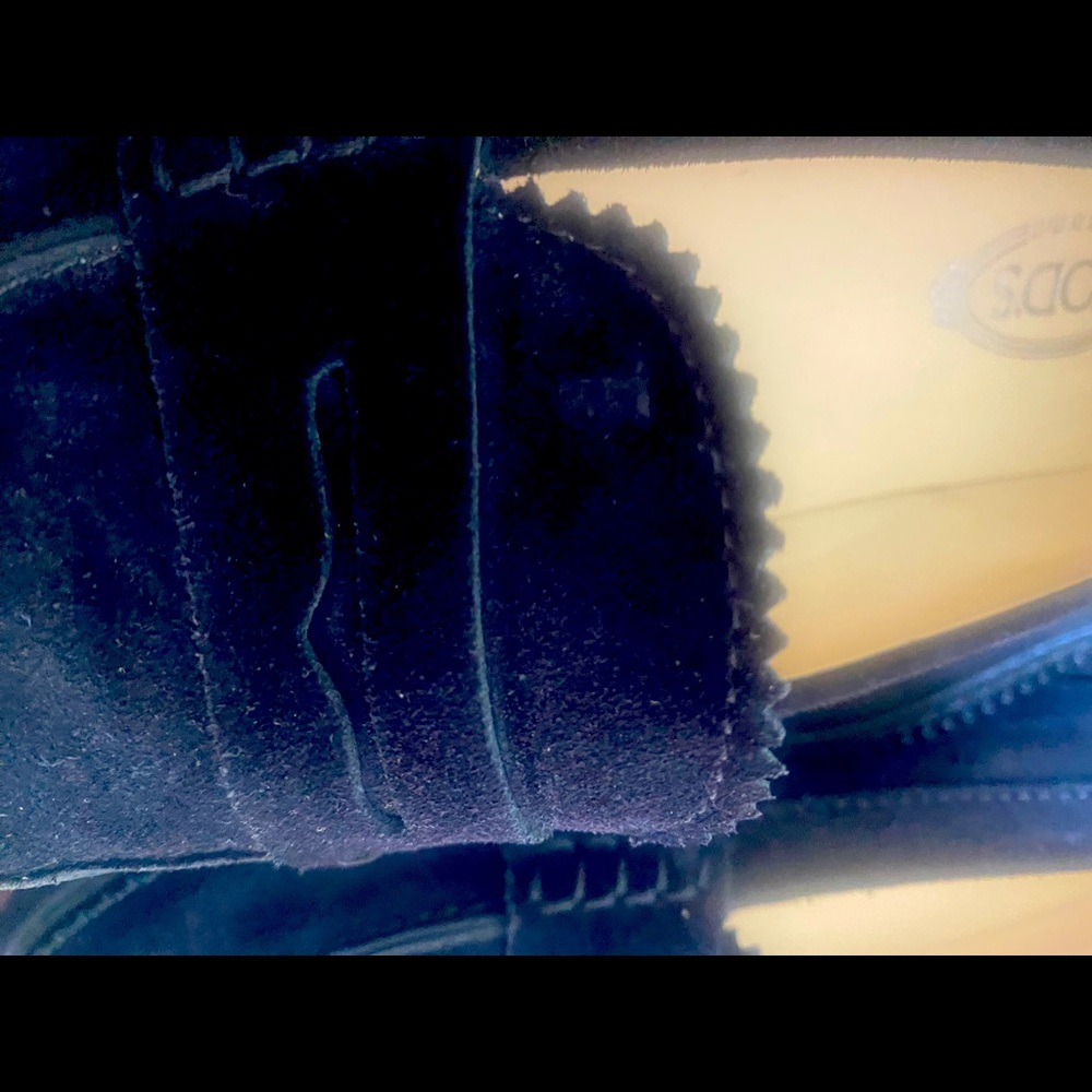 TOD’S maid in Italy  Navy suede loafers .